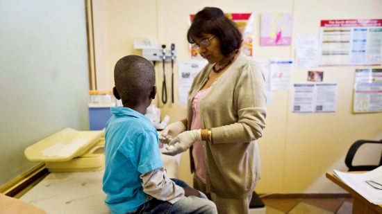 A boy receives an HIV test at a PEPFAR-funded clinic in South Africa. Image: Gallo Images / Getty